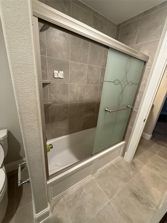 29431 Amber Meadows Ct, Katy, TX 77494 - full bath featuring toilet, enclosed tub / shower combo, and tile patterned floors