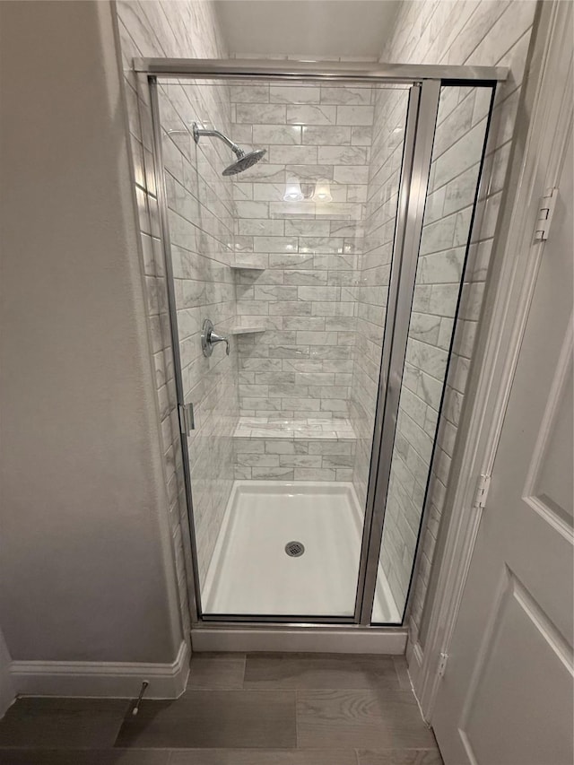 29431 Amber Meadows Ct, Katy, TX 77494 - bathroom with a stall shower and baseboards