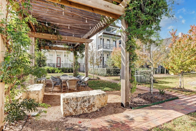 8754 Park Kolbe Ln, Houston, TX 77080 - view of patio / terrace with outdoor dining space and a pergola
