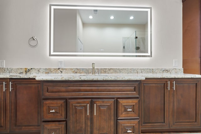 9171 Briar Frst, Houston, TX 77024 - full bathroom with a shower stall and vanity
