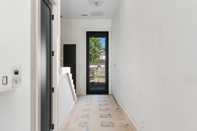 entryway with visible vents and baseboards