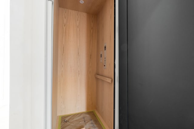 room details with elevator and baseboards