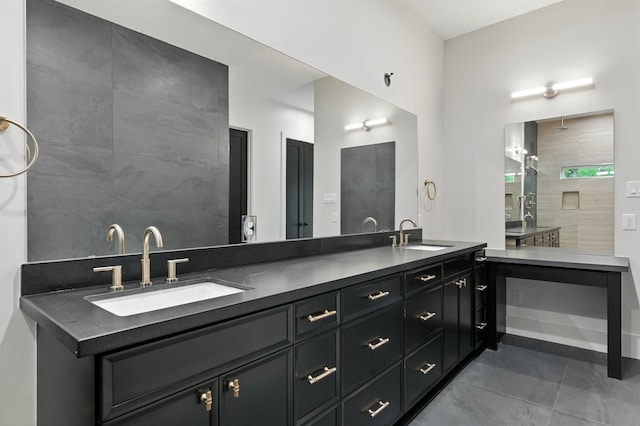 6536 Community Dr, West University Place, TX 77005 - bathroom with double vanity and tile patterned floors