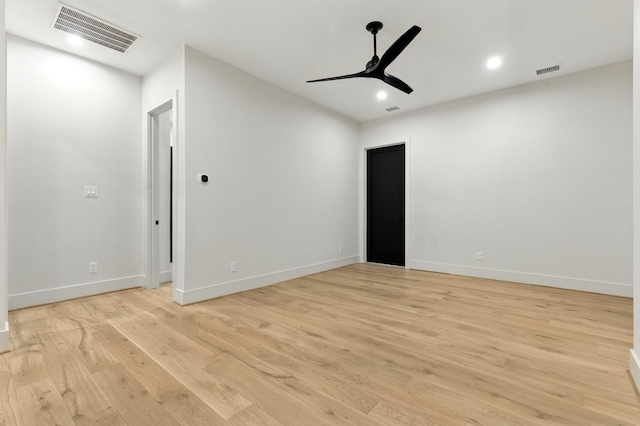 6536 Community Dr, West University Place, TX 77005 - unfurnished room with a ceiling fan, light wood-style floors, and recessed lighting