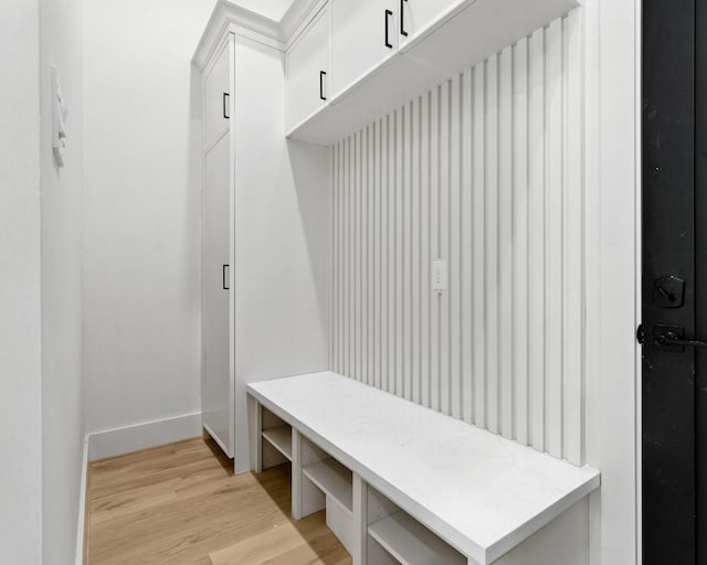 6536 Community Dr, West University Place, TX 77005 - mudroom with light wood-type flooring and baseboards