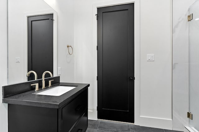 6536 Community Dr, West University Place, TX 77005 - bathroom with vanity and tile patterned flooring