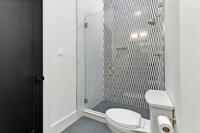 6536 Community Dr, West University Place, TX 77005 - bathroom featuring a stall shower and tile patterned flooring