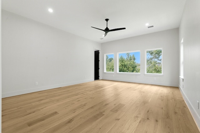 6536 Community Dr, West University Place, TX 77005 - unfurnished room with ceiling fan, light wood-type flooring, and recessed lighting