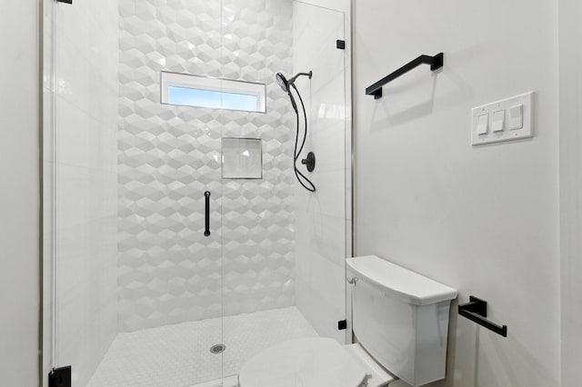 6536 Community Dr, West University Place, TX 77005 - bathroom featuring a stall shower and toilet