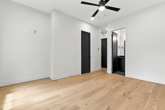 6536 Community Dr, West University Place, TX 77005 - spare room with light wood-style flooring, a ceiling fan, and recessed lighting