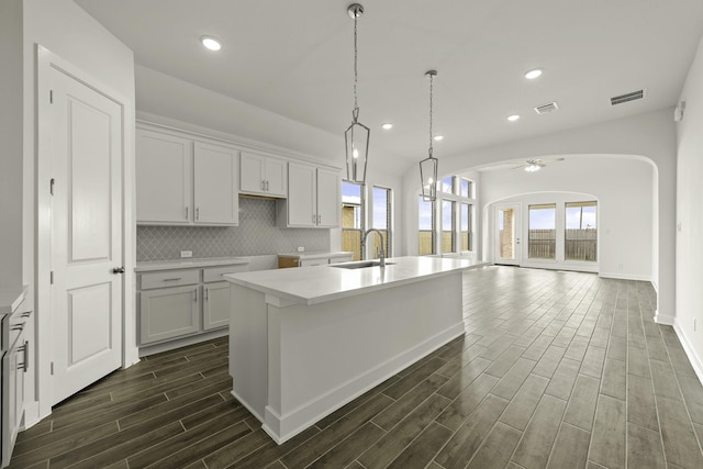 10403 Shining Dawn Way, Richmond, TX 77406 - kitchen featuring a sink, dark wood-style floors, an island with sink, a ceiling fan, and recessed lighting