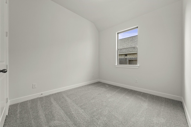 10403 Shining Dawn Way, Richmond, TX 77406 - spare room with carpet flooring, lofted ceiling, and baseboards