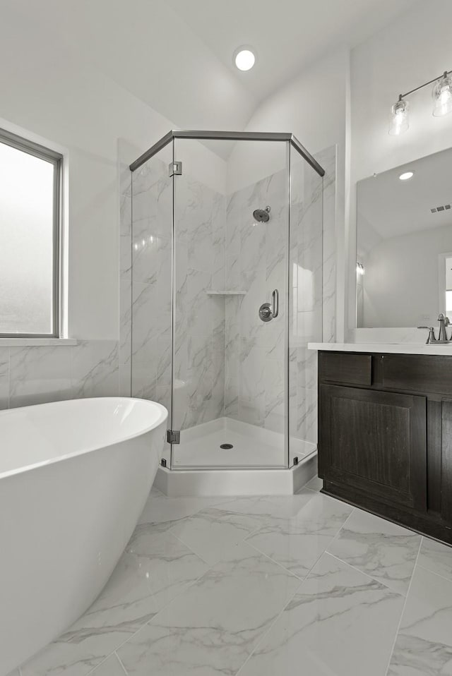 10403 Shining Dawn Way, Richmond, TX 77406 - full bath featuring a freestanding tub, a marble finish shower, vanity, marble finish flooring, and recessed lighting