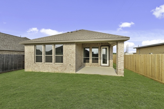 10403 Shining Dawn Way, Richmond, TX 77406 - back of property with brick siding, a patio, and roof with shingles