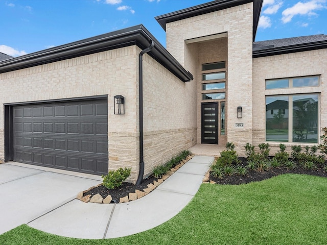 3193 Stingray Cove Dr, Katy, TX 77493 - entrance to property with an attached garage, concrete driveway, a yard, and brick siding