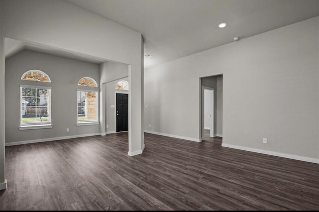 716 Ivory Creek Ct, Willis, TX 77378 - unfurnished living room with recessed lighting, baseboards, and dark wood-style floors