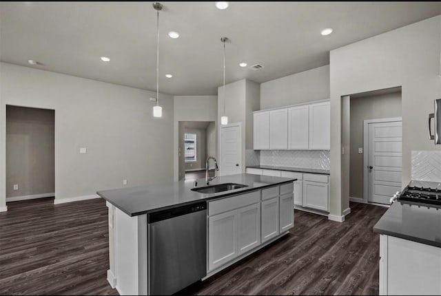 716 Ivory Creek Ct, Willis, TX 77378 - kitchen featuring stainless steel dishwasher, white cabinets, decorative backsplash, and a sink