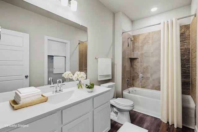 716 Ivory Creek Ct, Willis, TX 77378 - full bathroom featuring shower / bath combo, wood finished floors, vanity, toilet, and recessed lighting
