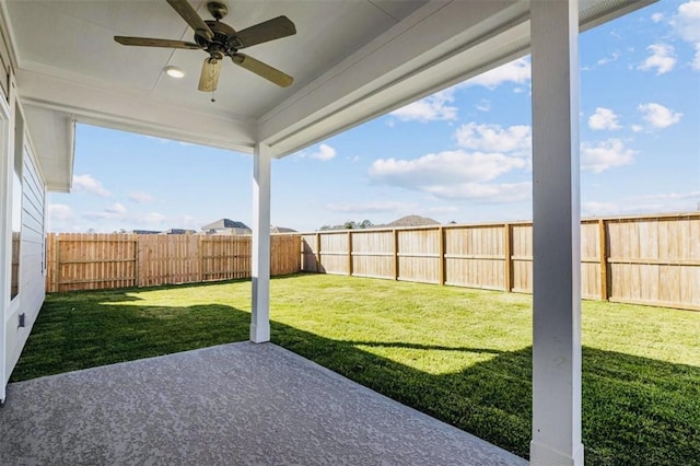 716 Ivory Creek Ct, Willis, TX 77378 - view of yard with a fenced backyard, a patio, and ceiling fan