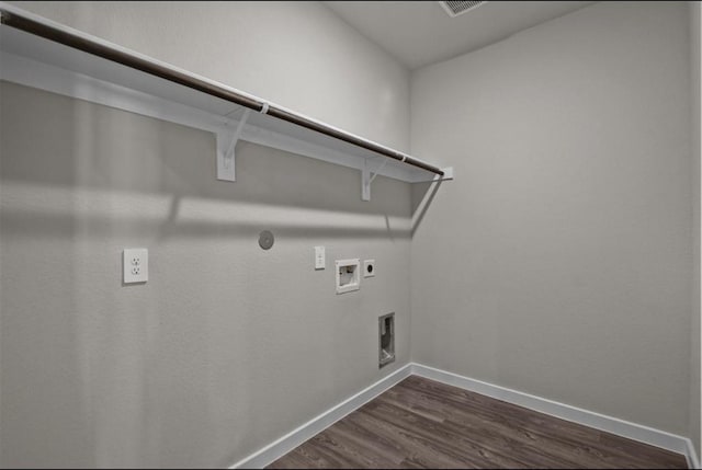 716 Ivory Creek Ct, Willis, TX 77378 - washroom featuring washer hookup, laundry area, dark wood-style flooring, electric dryer hookup, and baseboards