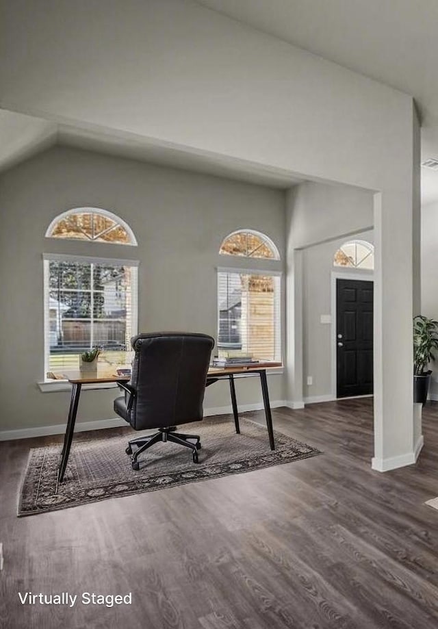716 Ivory Creek Ct, Willis, TX 77378 - office area with a healthy amount of sunlight, baseboards, wood finished floors, and lofted ceiling