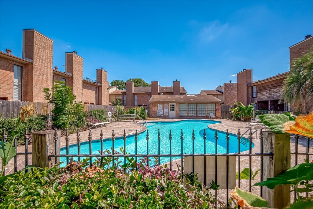 10912 Gulf Fwy Unit 51, Houston, TX 77034 - pool with fence and a patio area