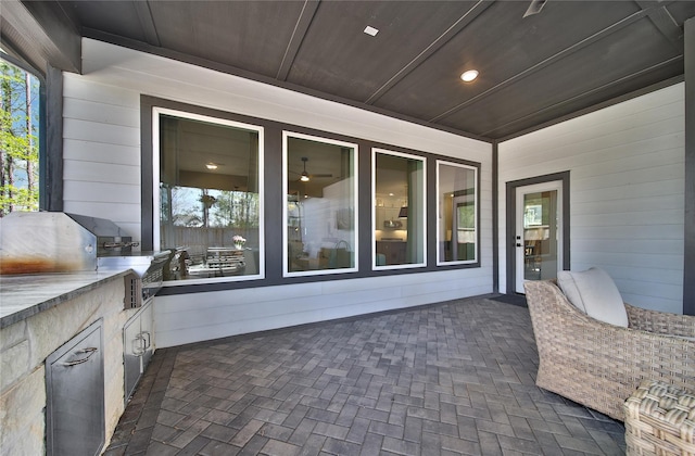325 Bromley Square Dr, Montgomery, TX 77316 - view of patio / terrace featuring exterior kitchen and grilling area