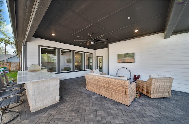 325 Bromley Square Dr, Montgomery, TX 77316 - view of patio / terrace with an outdoor living space, a ceiling fan, and fence