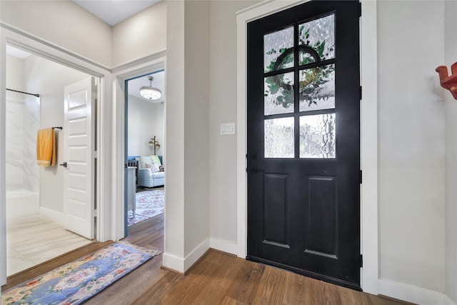 325 Bromley Square Dr, Montgomery, TX 77316 - entryway featuring wood finished floors and baseboards