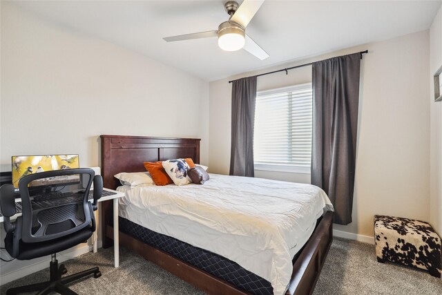 carpeted bedroom with baseboards and ceiling fan