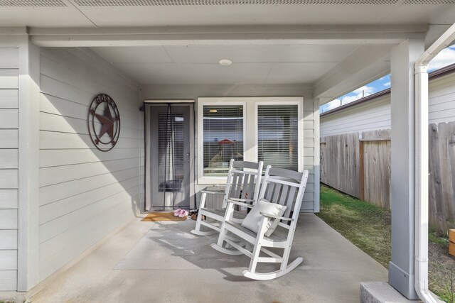 view of patio with fence