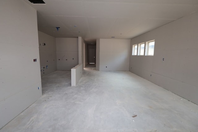 21873 Colorado Bend Ln, Porter, TX 77365 - unfurnished room featuring unfinished concrete floors