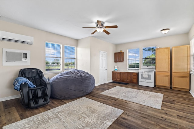 3358 County Road 172, Alvin, TX 77511 - living area featuring a wall mounted air conditioner, a wall mounted AC, a ceiling fan, and plenty of natural light