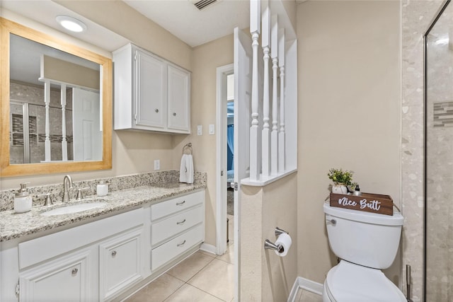 3358 County Road 172, Alvin, TX 77511 - full bath featuring tile patterned flooring, vanity, toilet, baseboards, and visible vents