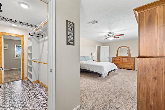 3358 County Road 172, Alvin, TX 77511 - bedroom featuring carpet, baseboards, a textured ceiling, and visible vents
