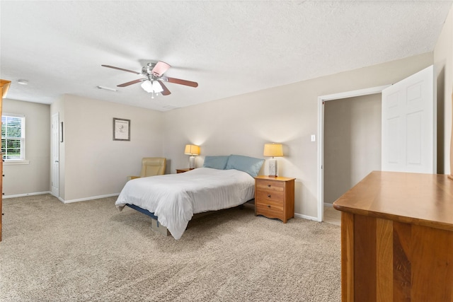 3358 County Road 172, Alvin, TX 77511 - bedroom featuring baseboards, light colored carpet, and a textured ceiling