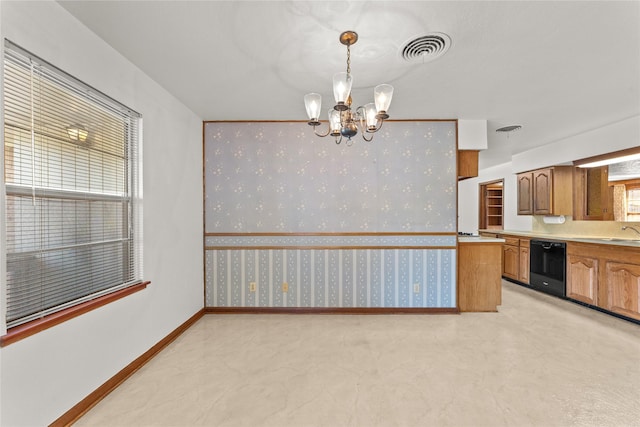 1403 Marlock Ln, Pasadena, TX 77502 - kitchen featuring black dishwasher, a chandelier, brown cabinetry, light countertops, and baseboards
