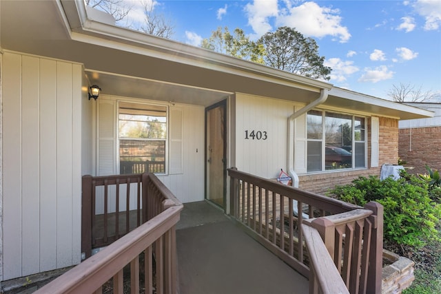 1403 Marlock Ln, Pasadena, TX 77502 - view of exterior entry with brick siding and covered porch