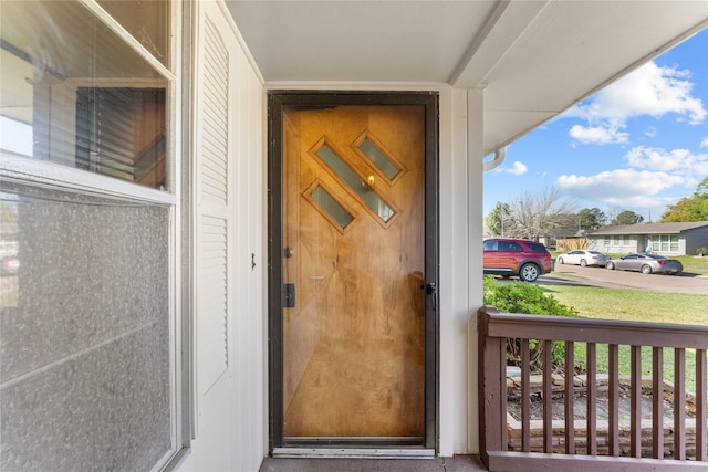 1403 Marlock Ln, Pasadena, TX 77502 - view of exterior entry with a porch