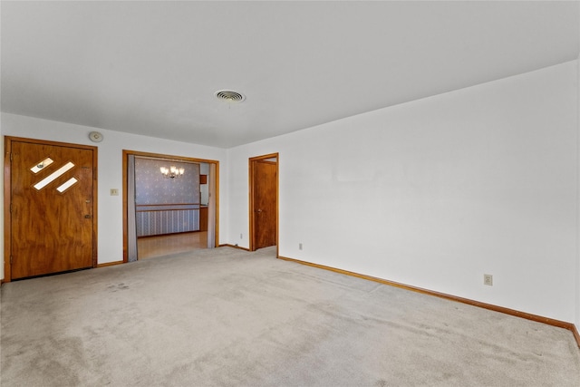 1403 Marlock Ln, Pasadena, TX 77502 - carpeted empty room featuring a chandelier and baseboards