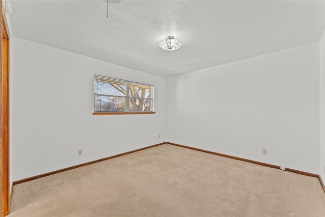 1403 Marlock Ln, Pasadena, TX 77502 - empty room with carpet and baseboards