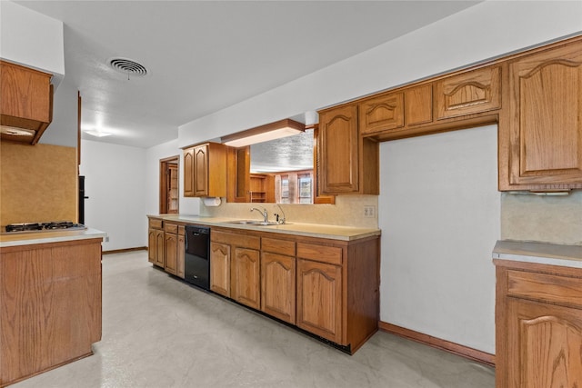 1403 Marlock Ln, Pasadena, TX 77502 - kitchen featuring dishwasher, a sink, light countertops, brown cabinetry, and decorative backsplash