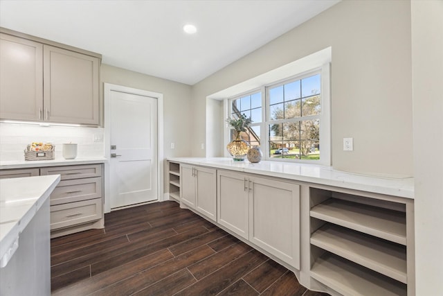18602 Carriage Ct, Houston, TX 77058 - kitchen with light countertops, dark wood-type flooring, backsplash, recessed lighting, and open shelves