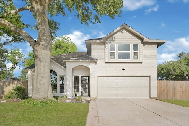 1410 Wesley Ln, Deer Park, TX 77536 - traditional home featuring brick siding, a garage, concrete driveway, and roof with shingles