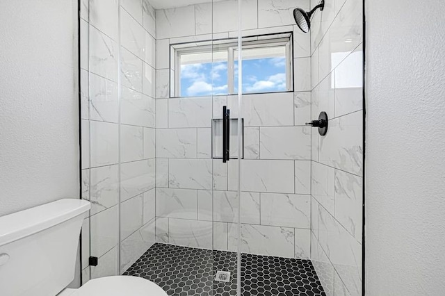 1410 Wesley Ln, Deer Park, TX 77536 - bathroom featuring toilet and a shower stall