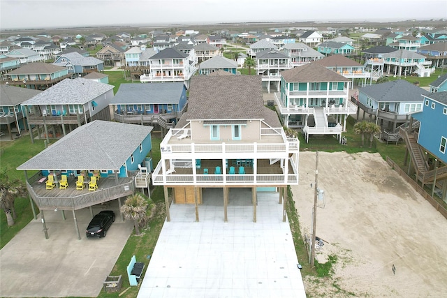 2627 Holiday Dr, Port Bolivar, TX 77650 - drone / aerial view with a residential view