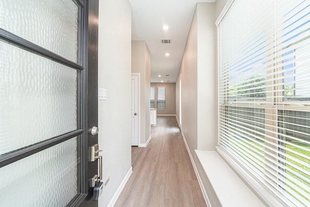 210 Fulton Station Dr, Houston, TX 77009 - corridor with recessed lighting, visible vents, baseboards, and wood finished floors