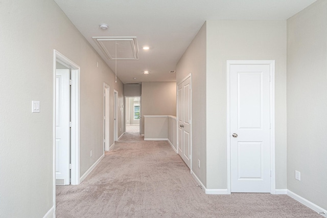 210 Fulton Station Dr, Houston, TX 77009 - hallway with attic access, baseboards, recessed lighting, and light colored carpet