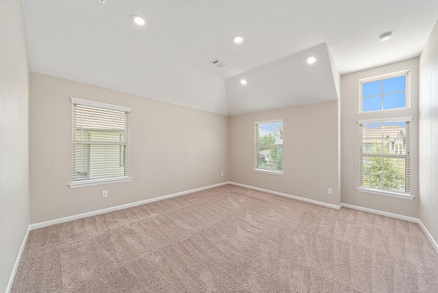 210 Fulton Station Dr, Houston, TX 77009 - carpeted empty room featuring baseboards, recessed lighting, and vaulted ceiling