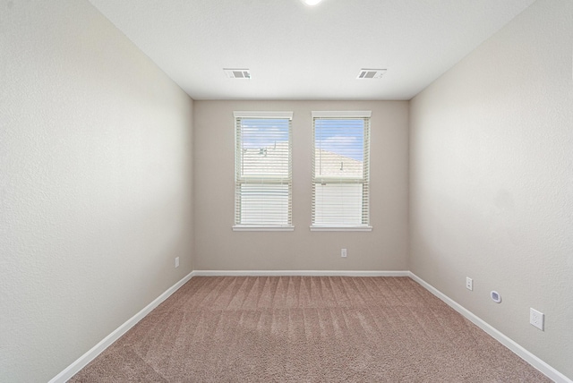 210 Fulton Station Dr, Houston, TX 77009 - carpeted empty room featuring visible vents and baseboards